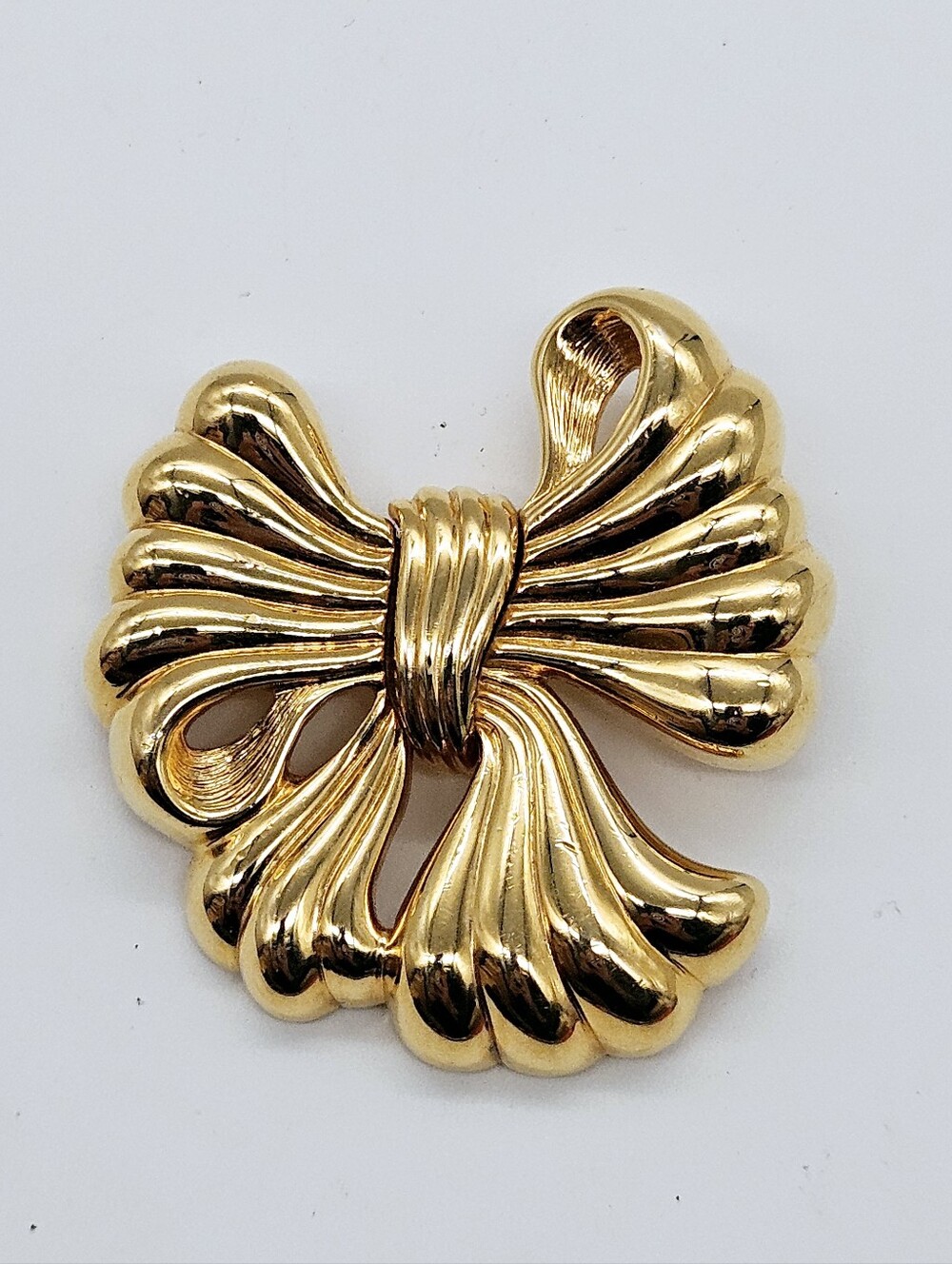 MONET | vintage gold tone bow brooch